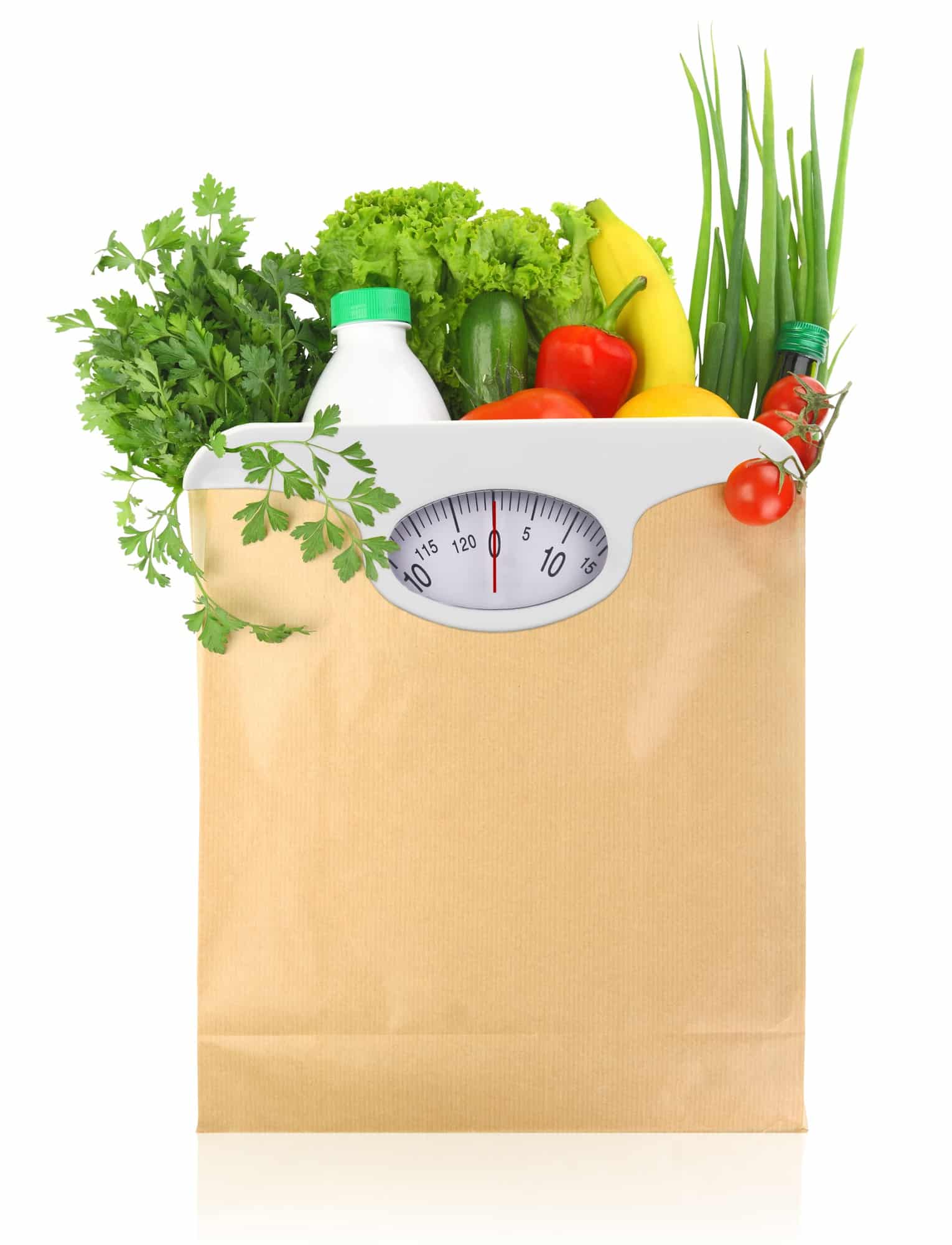 Fresh groceries in a paper bag with weight scale dial